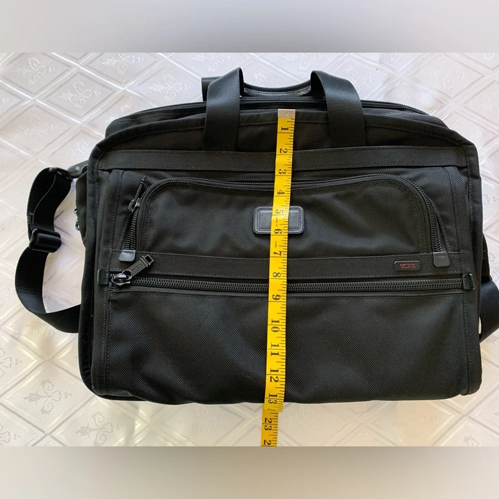 Tumi Black Travel Bag with Adjustable Strap